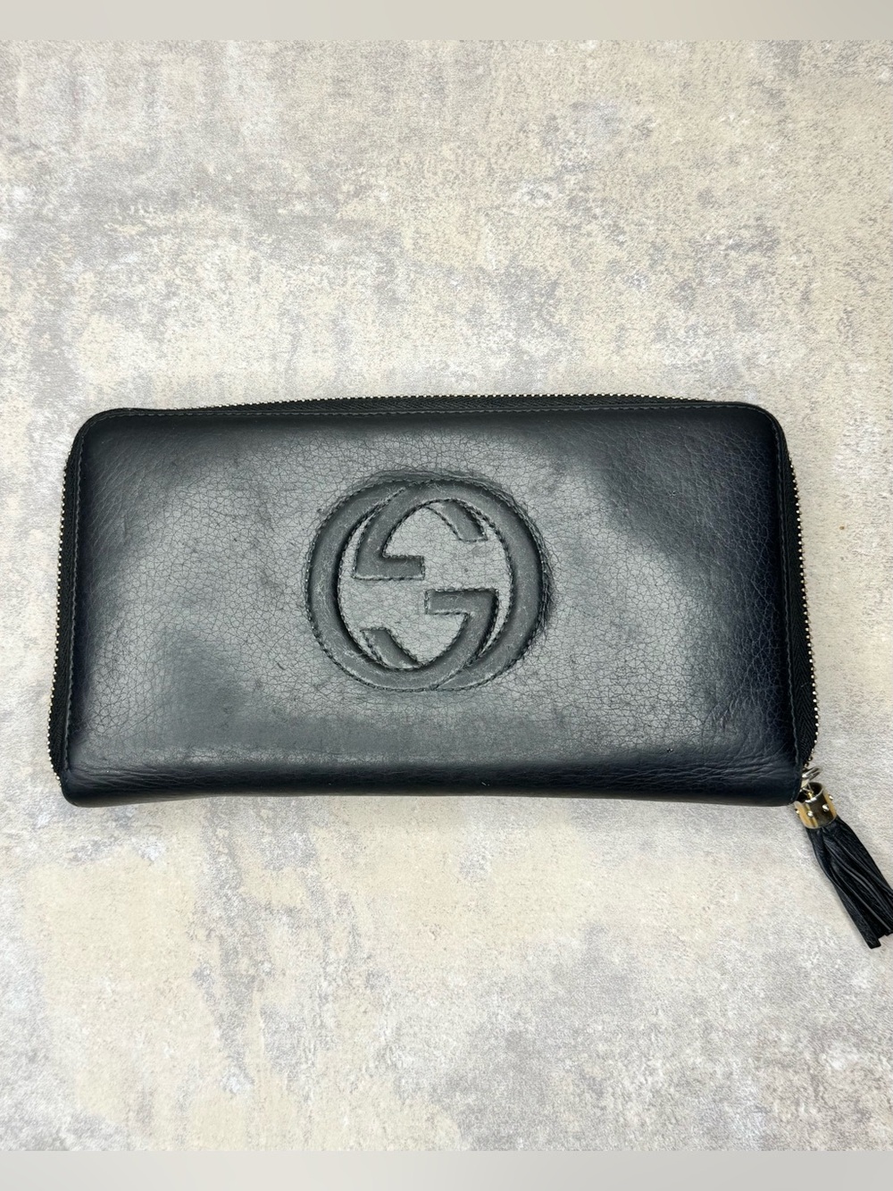 Gucci Black Leather Zip-Around Wallet with Embossed Interlocking G